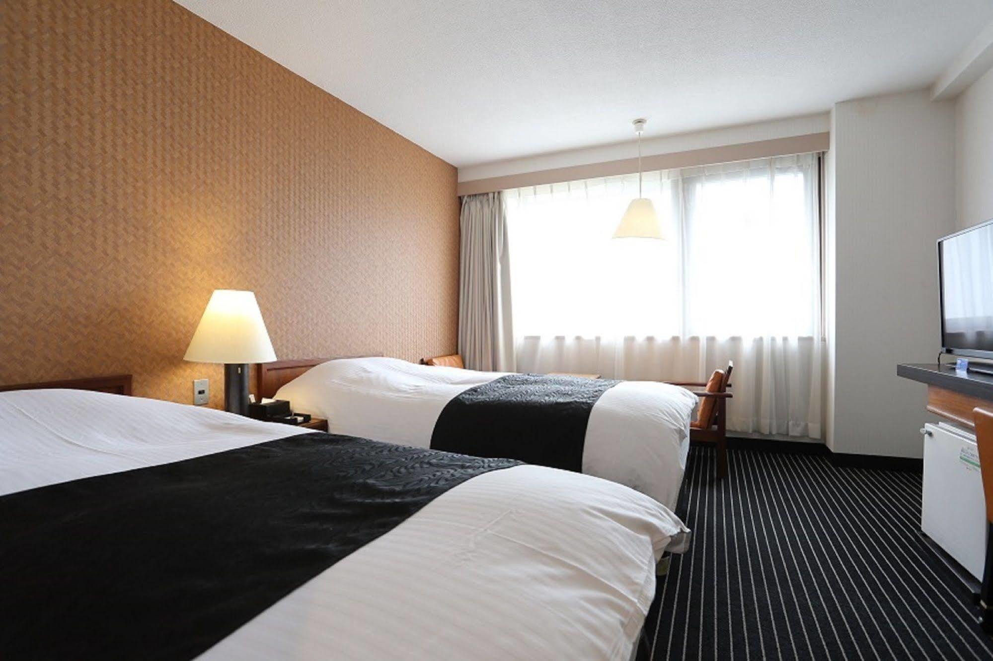 APA Hotel Okayamaekimae Bagian luar foto