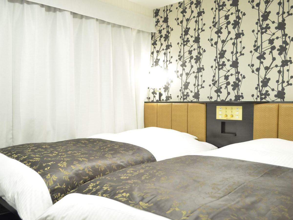 APA Hotel Okayamaekimae Bagian luar foto